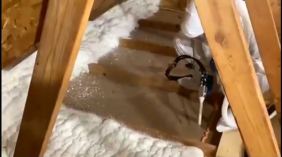 Spray foam insulation at attic eaves